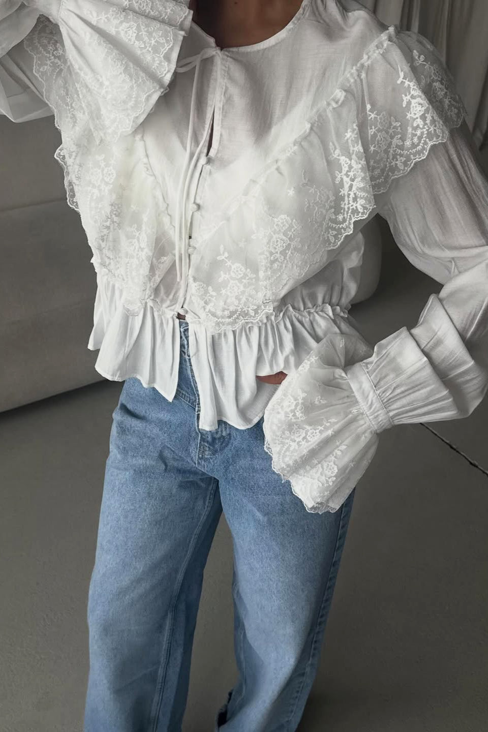 Lace Yoke Ruffle Hem Blouse