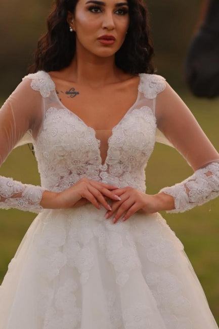 Designer Long A-line V-neck White Lacy Wedding Gown with Elegant Long Sleeves - Fashionpara