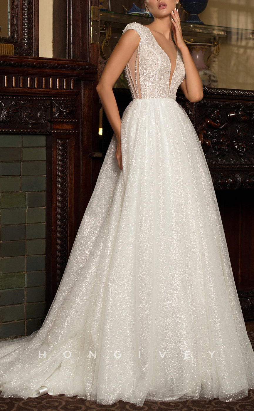 H1029 - Ornate Glitter Plunging Neck Cap Sleeves Beaded Long Wedding Dress - Fashionpara