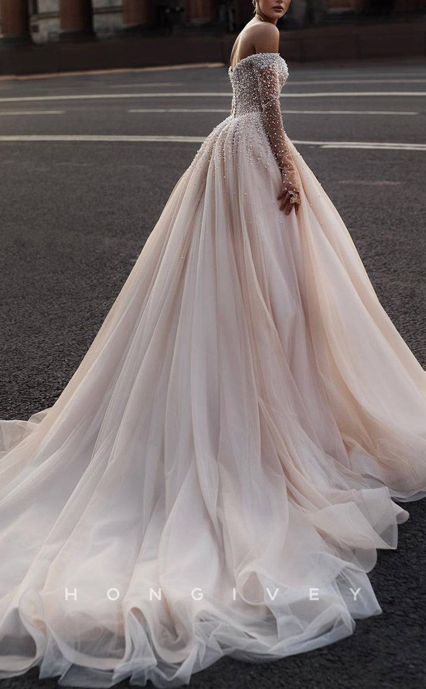 H1555 - Chic Tulle A-Line Off-Shoulder Long Sleeve Empire Beaded With Train Wedding Dress - Fashionpara