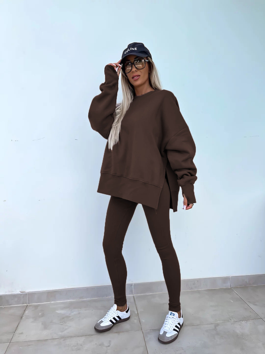 Loose long-sleeved round neck slit top and tight pants two-piece set