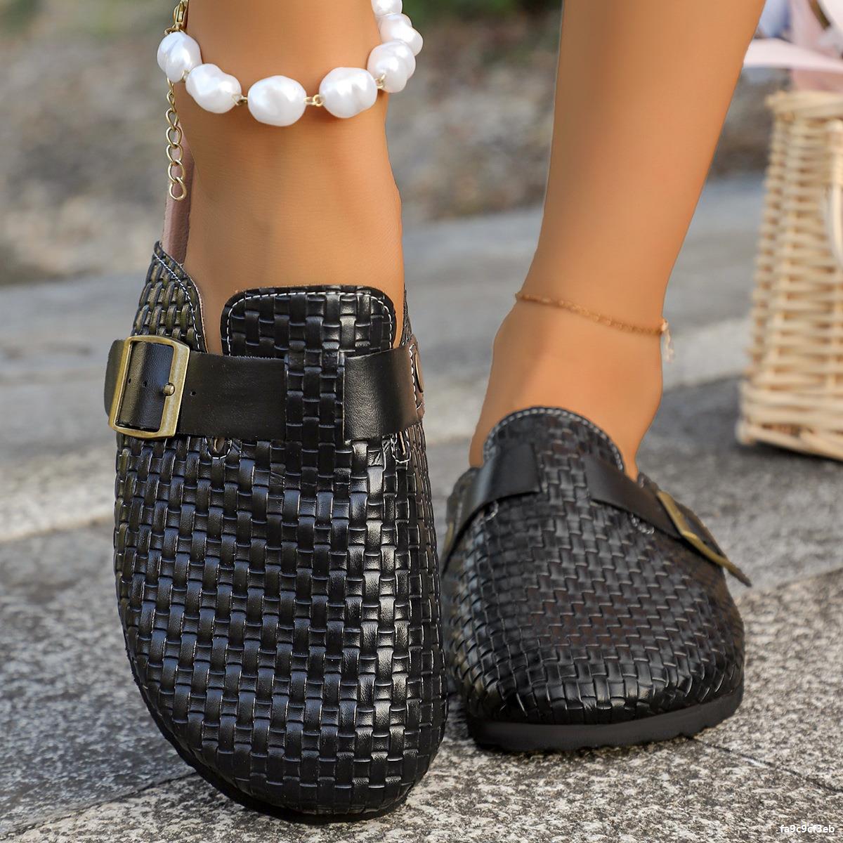 Black round-toe woven Birkenstock slippers