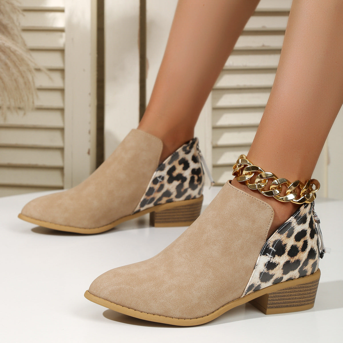Suede leopard print paneled back zip booties