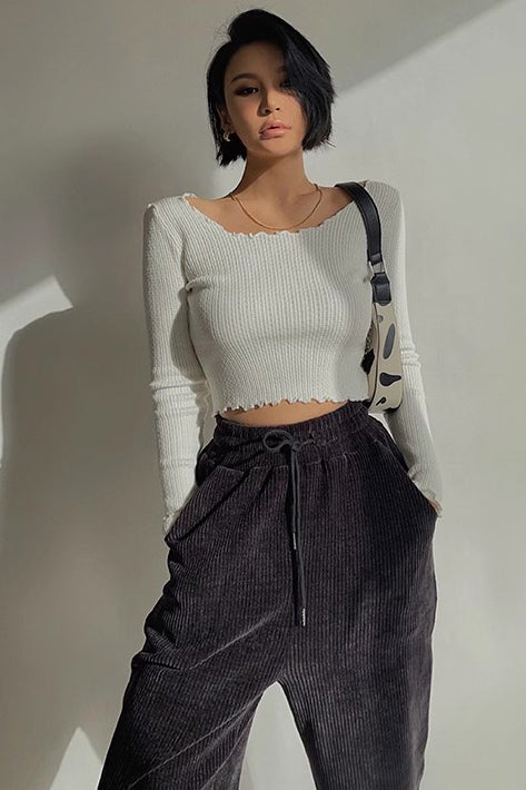 Rib-Knit Cut Out Sweater with Elegant Ruffle Trim