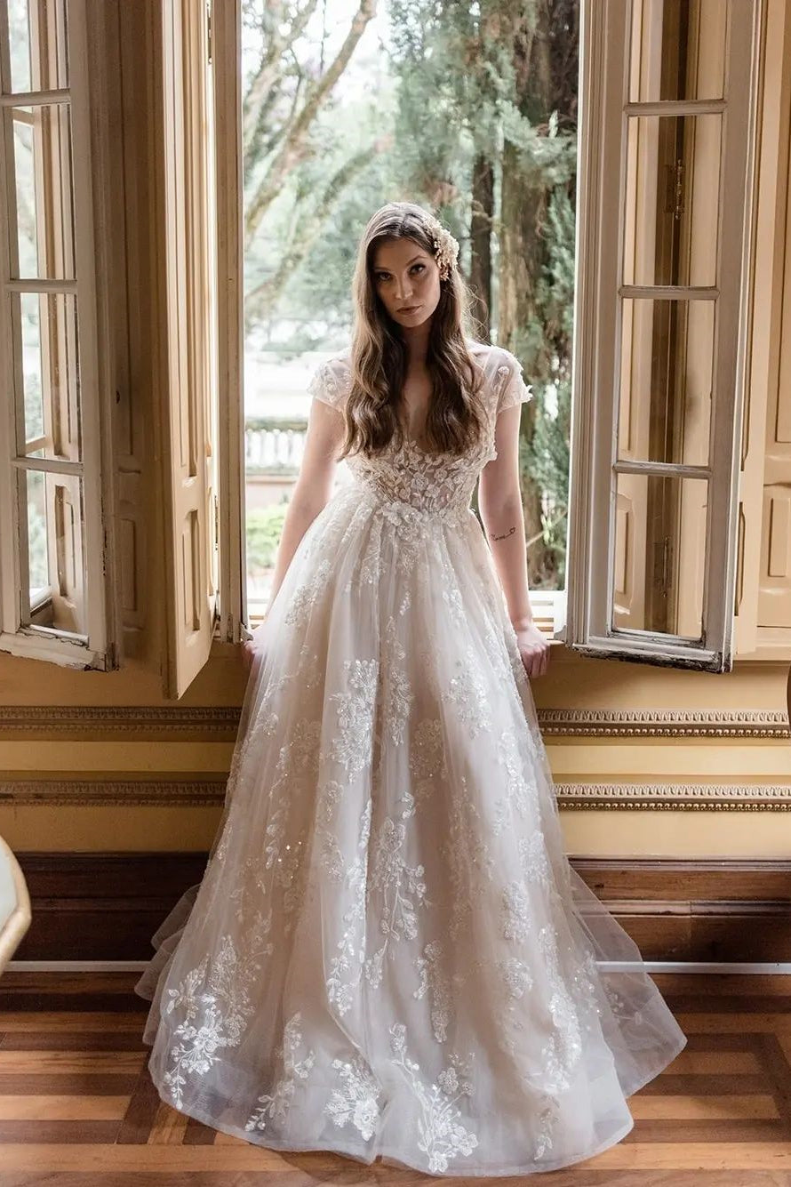 Elegant Long A-line V-neck Wedding Dress with Cap Sleeves and Lace Details - Fashionpara