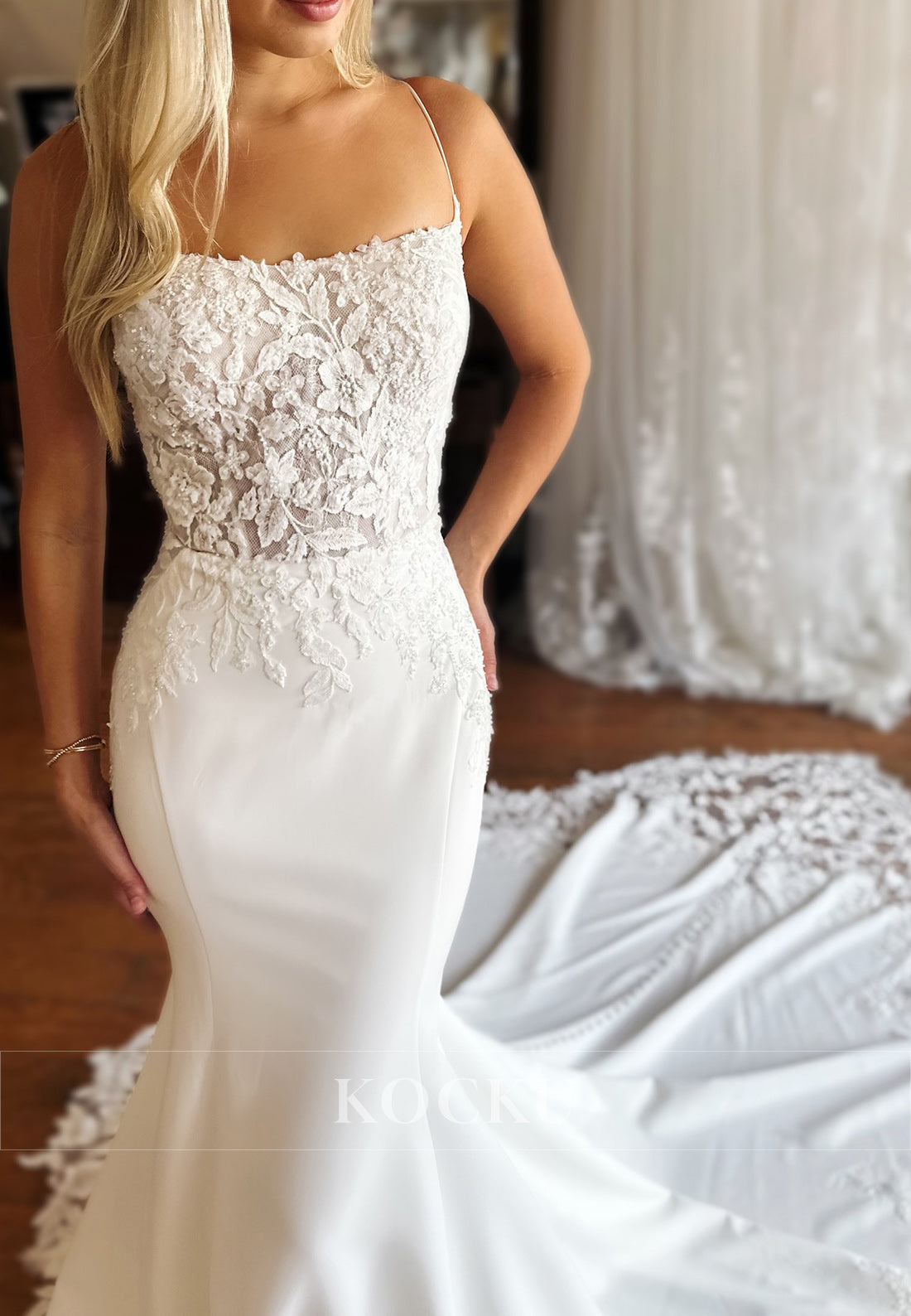 Elegant Spaghetti Strap Mermaid Wedding Dress with Lace Bodice and Train