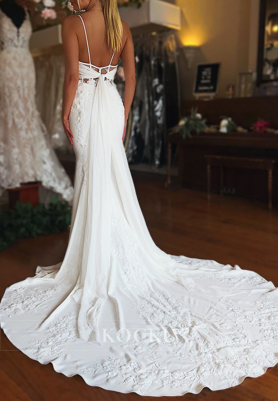 Elegant Spaghetti Strap Mermaid Wedding Dress with Lace, Open Back Bow & Train