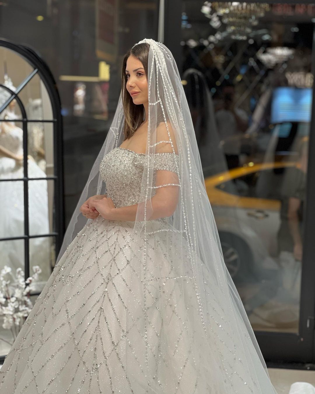 Charming Floor-Length Off-The-Shoulder A-Line Sequined Wedding Dress with Court Train - Fashionpara