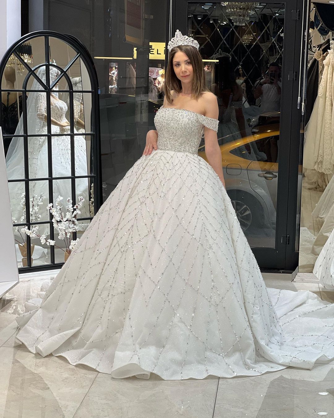 Charming Floor-Length Off-The-Shoulder A-Line Sequined Wedding Dress with Court Train - Fashionpara