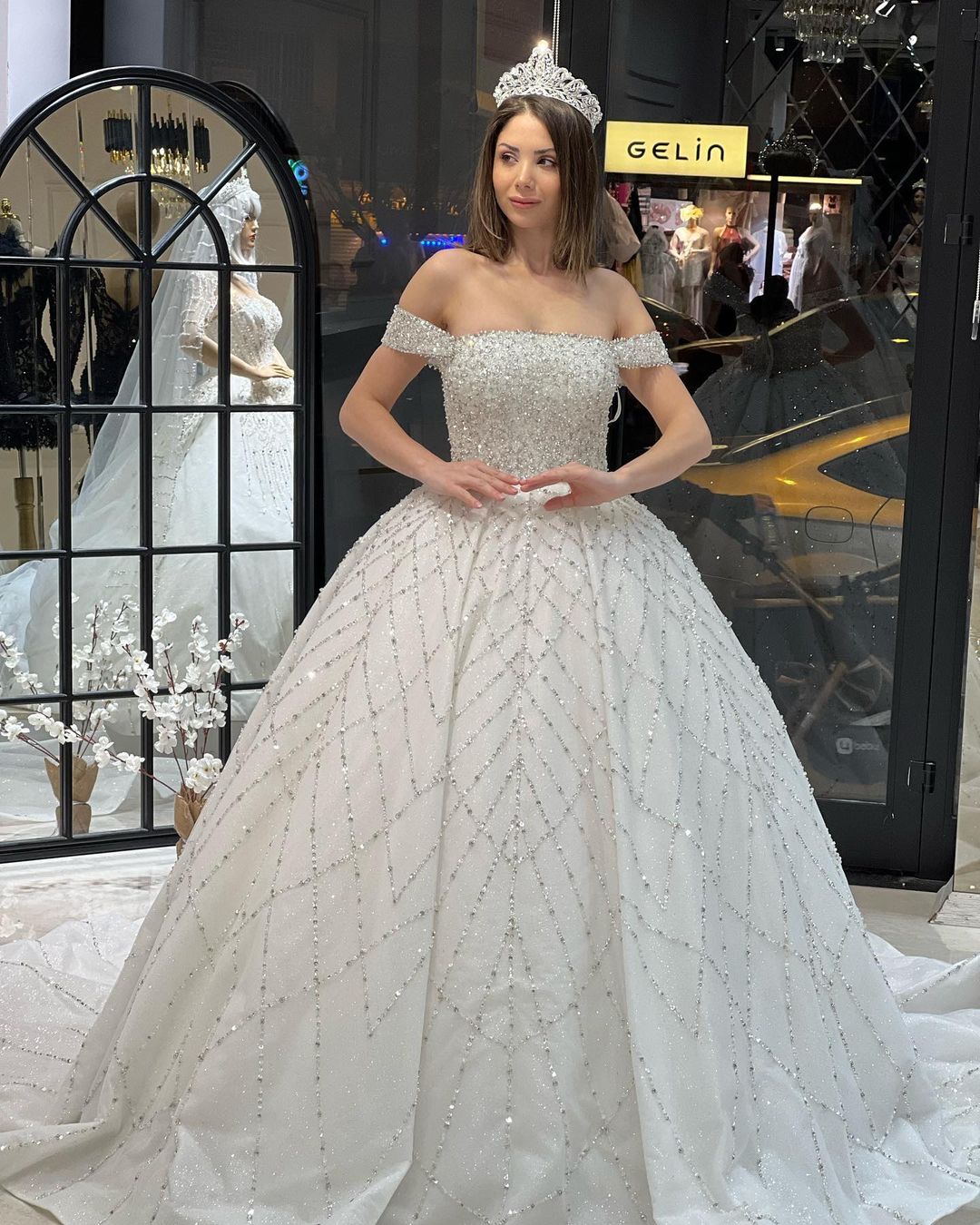 Charming Floor-Length Off-The-Shoulder A-Line Sequined Wedding Dress with Court Train - Fashionpara