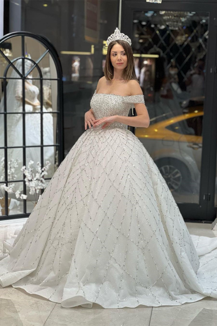 Charming Floor-Length Off-The-Shoulder A-Line Sequined Wedding Dress with Court Train - Fashionpara