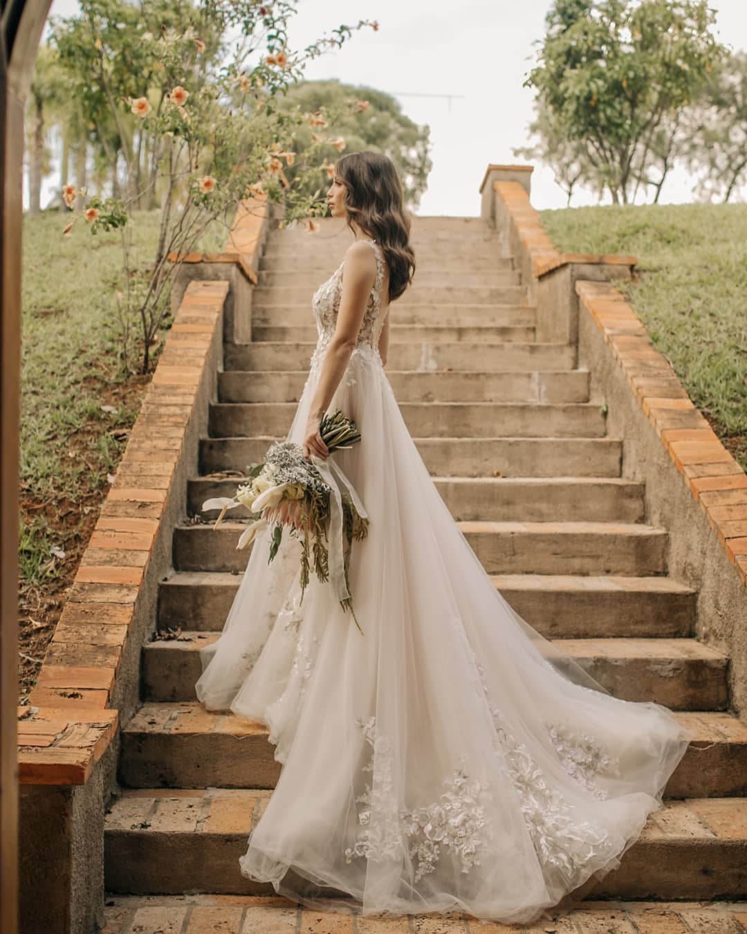 Chic A-Line Sleeveless Backless Wedding Dress with Floral Lace Accents - Fashionpara