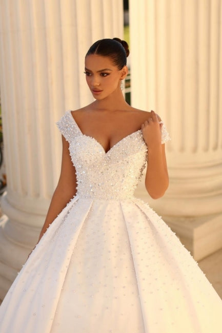 Elegant Sweetheart Cap Sleeves Ball Gown in Satin with Sequined Details for Weddings - Fashionpara