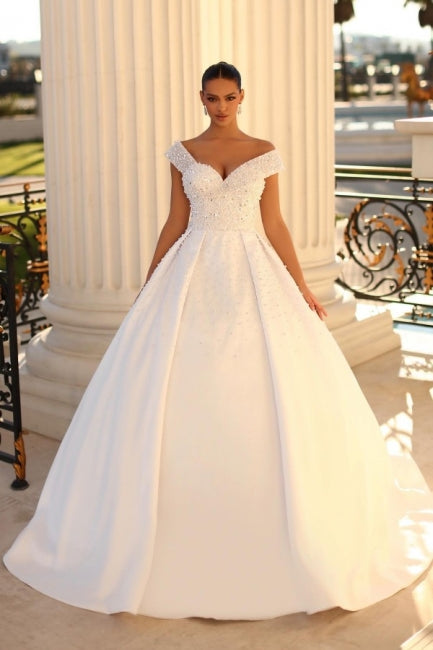 Elegant Sweetheart Cap Sleeves Ball Gown in Satin with Sequined Details for Weddings - Fashionpara
