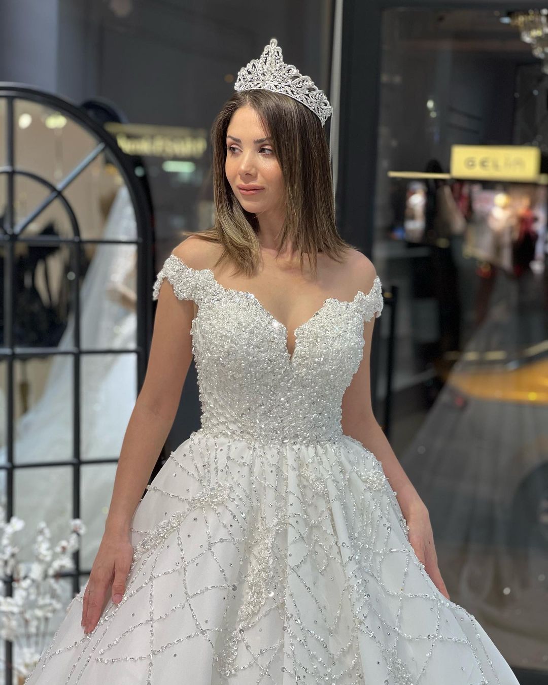Gorgeous Floor-Length Off-The-Shoulder Sweetheart A-Line Sequined Wedding Gown with Ruffled Details - Fashionpara