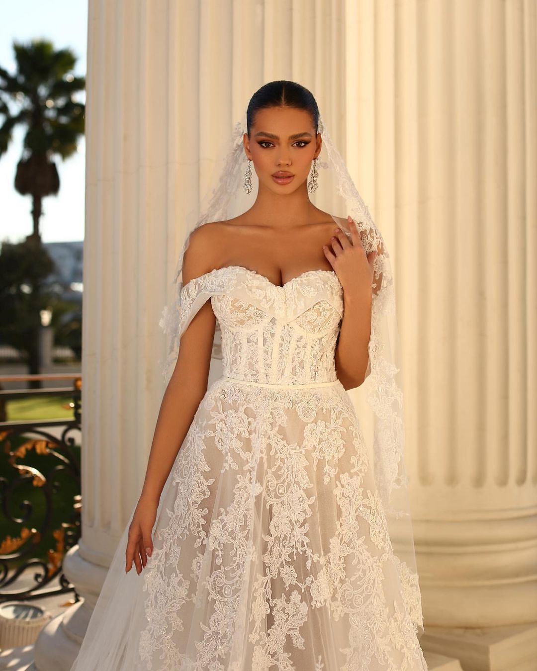 Glamorous Long White A-line Off-Shoulder Lace Wedding Dress with Elegant Details - Fashionpara