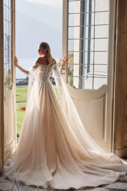 Exquisite Off-the-Shoulder Long Sleeves A-Line Wedding Dress in Lace with Beaded Details - Fashionpara