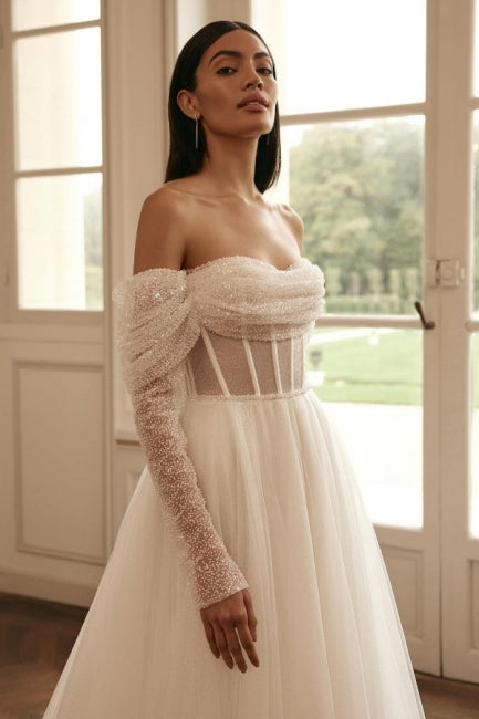 Luxury Long Sleeves Off-the-Shoulder A-Line Wedding Dress with Sequined Embellishments - Fashionpara