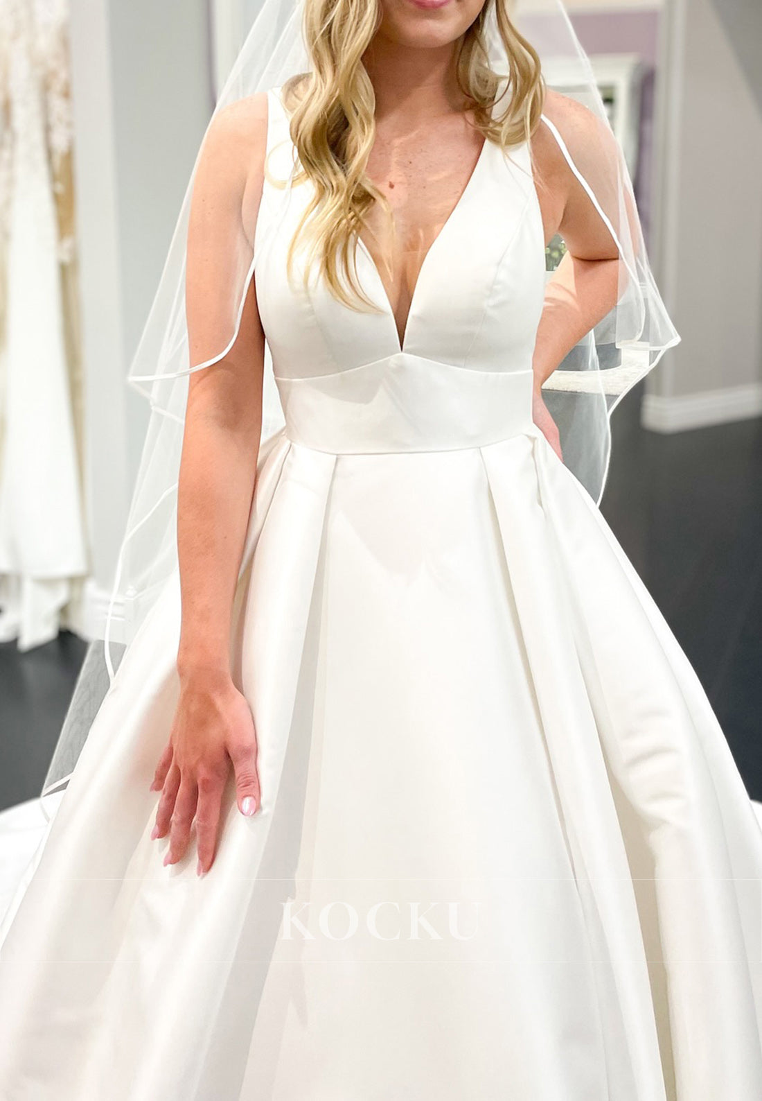 Plunge V - Neck Ball Gown Wedding Dress with Open Back and Train