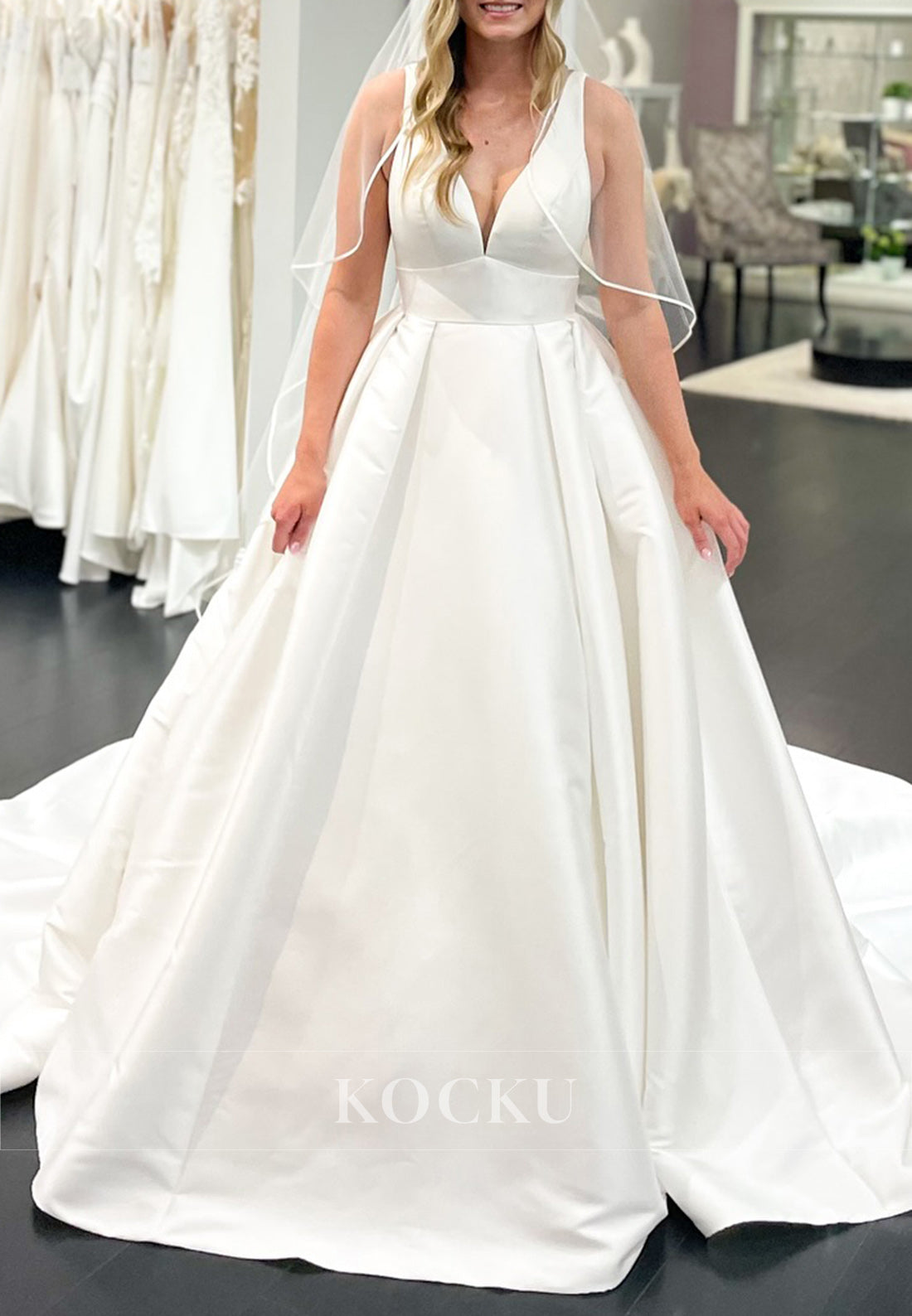Plunge V - Neck Ball Gown Wedding Dress with Open Back and Train