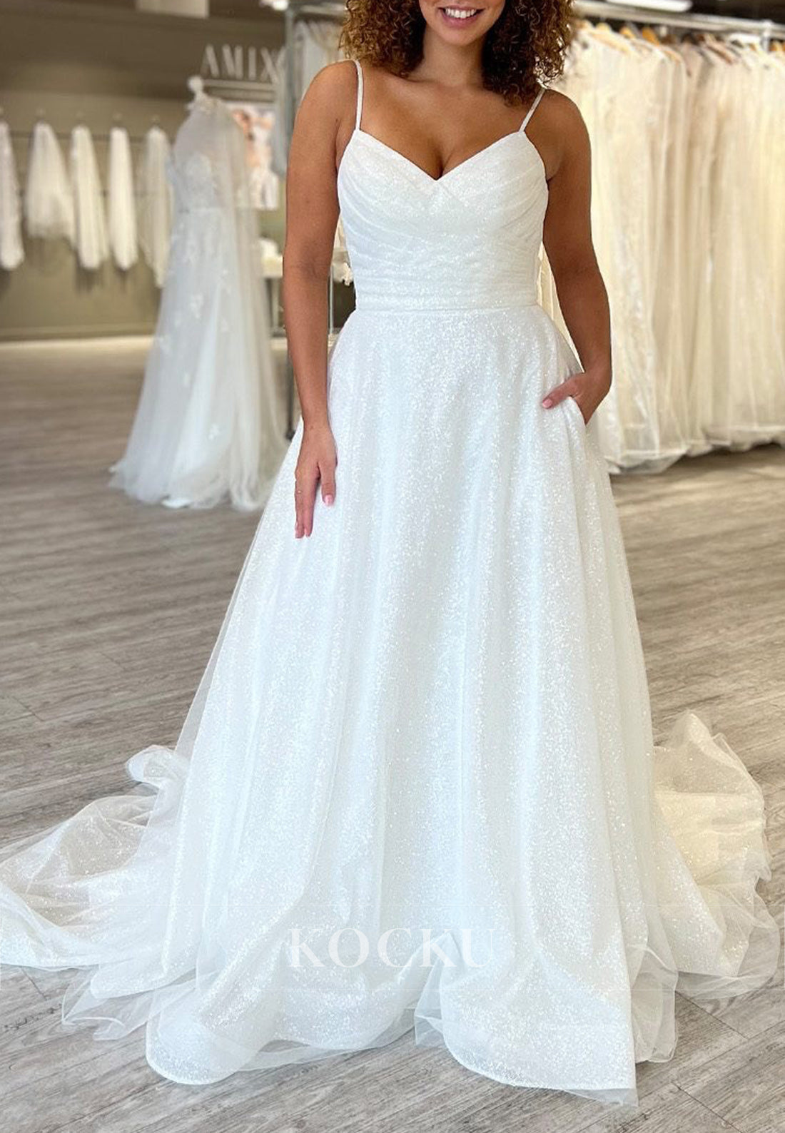 Spaghetti Strap V-Neck Glitter Tulle Ball Gown Wedding Dress with Pockets