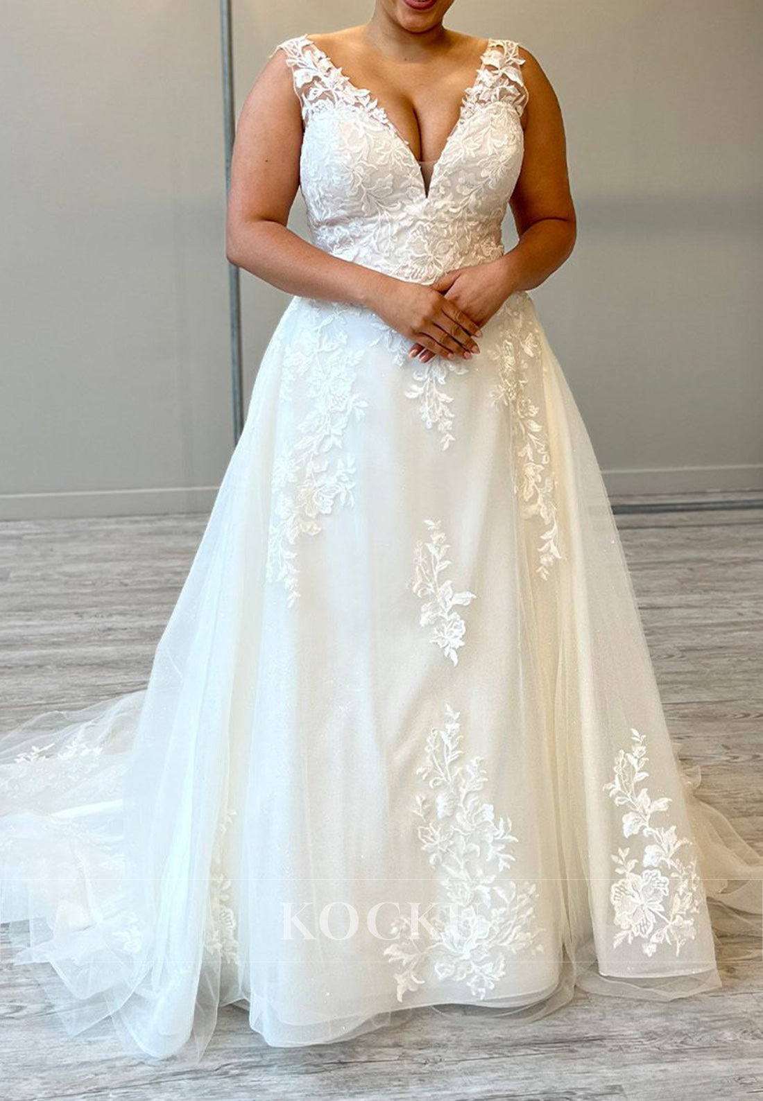 Plunge V - Neck Lace-Up Tulle Ball Gown Wedding Dress with Floral Appliqués
