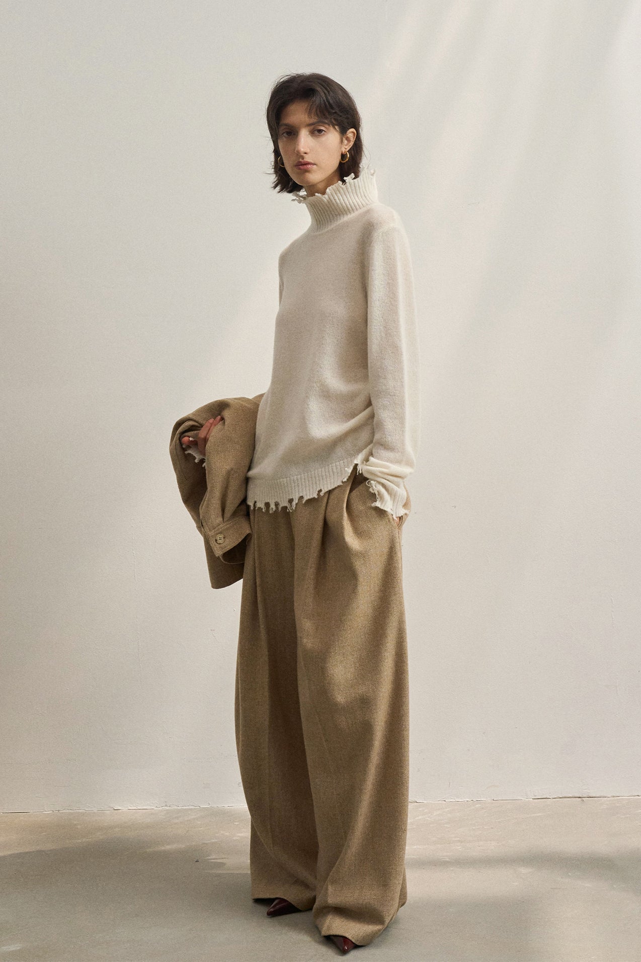 PrincessAce Fringed High Neck Knit Sweater for Effortless Style