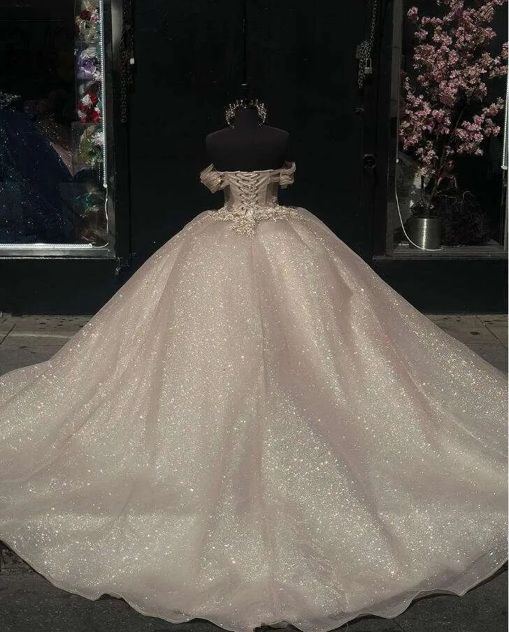 Shimmering Champagne Princess Quinceanera Dress with Off-the-Shoulder Glitter Corset for Sweet 16 Prom - Fashionpara