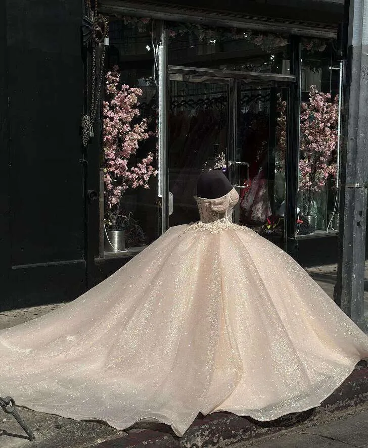 Shimmering Champagne Princess Quinceanera Dress with Off-the-Shoulder Glitter Corset for Sweet 16 Prom - Fashionpara