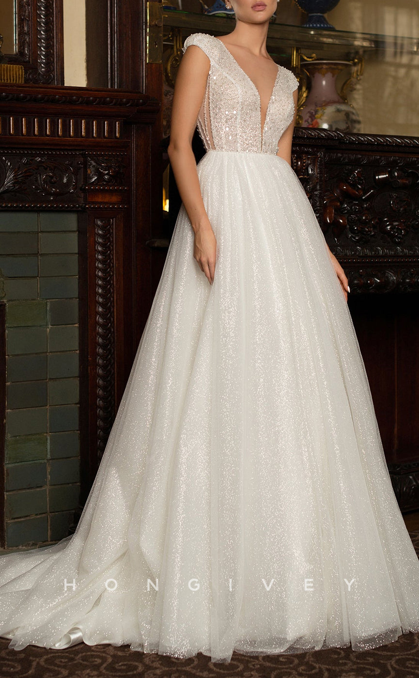 H1029 - Ornate Glitter Plunging Neck Cap Sleeves Beaded Long Wedding Dress - Fashionpara