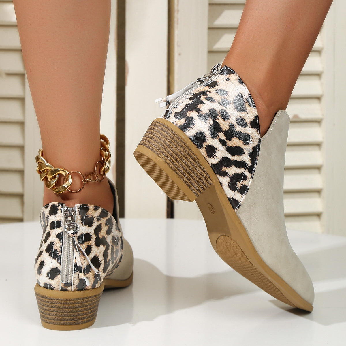 Suede leopard print paneled back zip booties