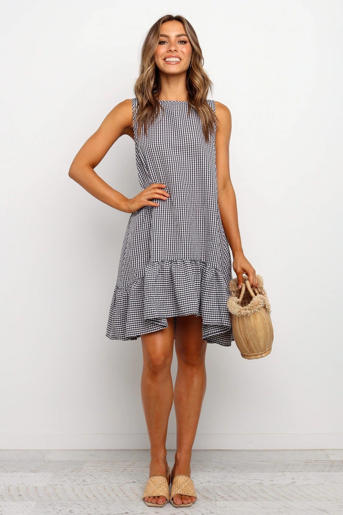 Gingham Round Neck Sleeveless Ruffle Hem Mini Dress