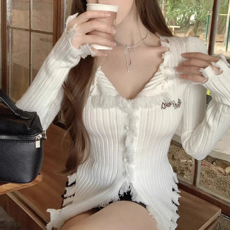 V-Neck Knit Sweater with Tassels and Irregular Hem Design