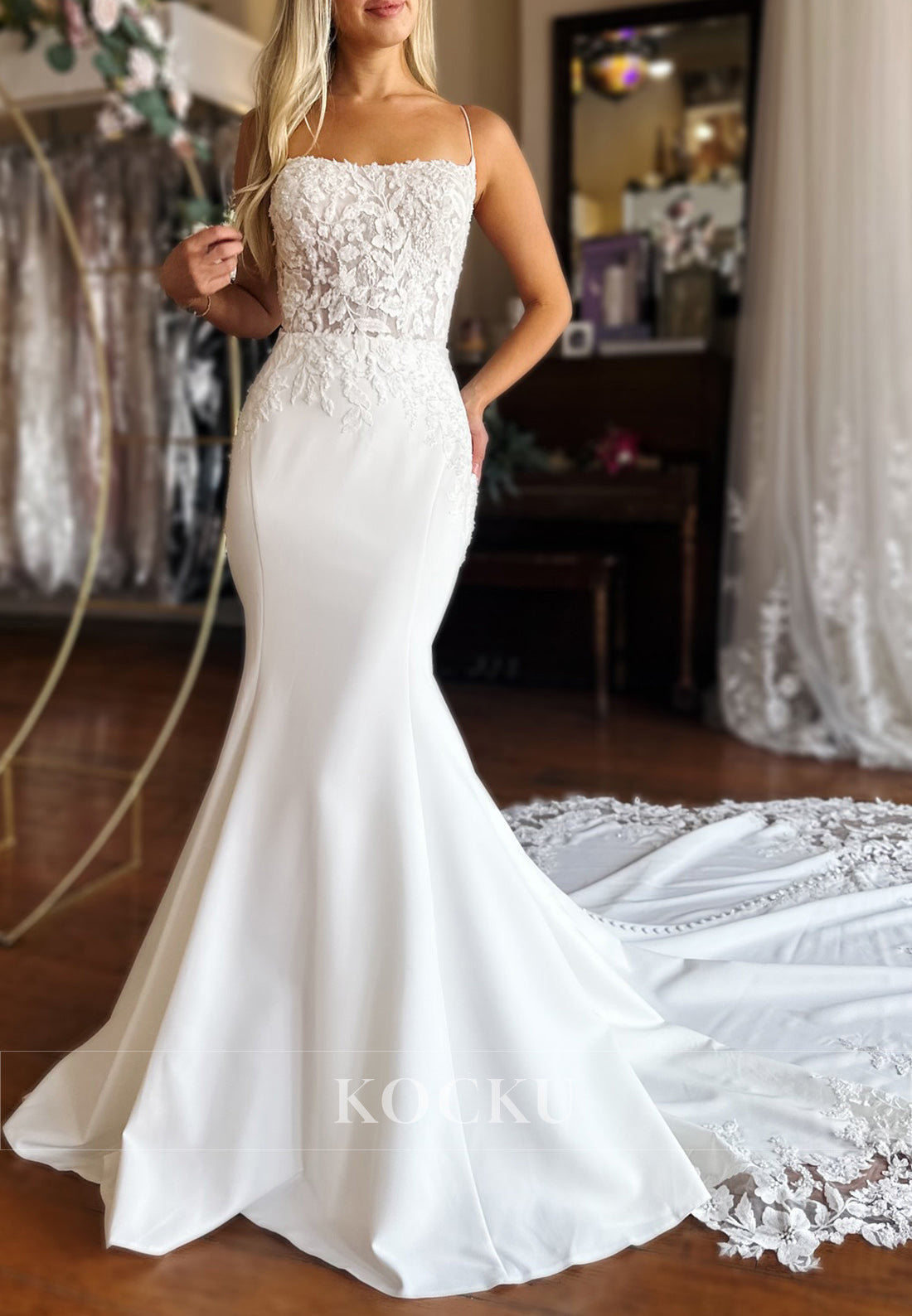 Elegant Spaghetti Strap Mermaid Wedding Dress with Lace Bodice and Train