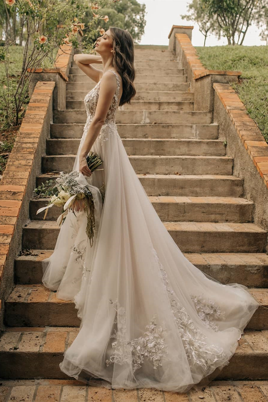 Chic A-Line Sleeveless Backless Wedding Dress with Floral Lace Accents - Fashionpara