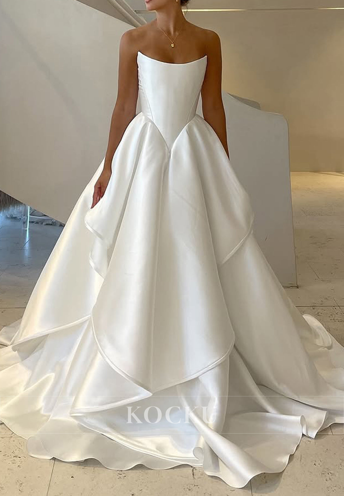 Elegant Strapless Satin Ball Gown Wedding Dress with Tiered Skirt