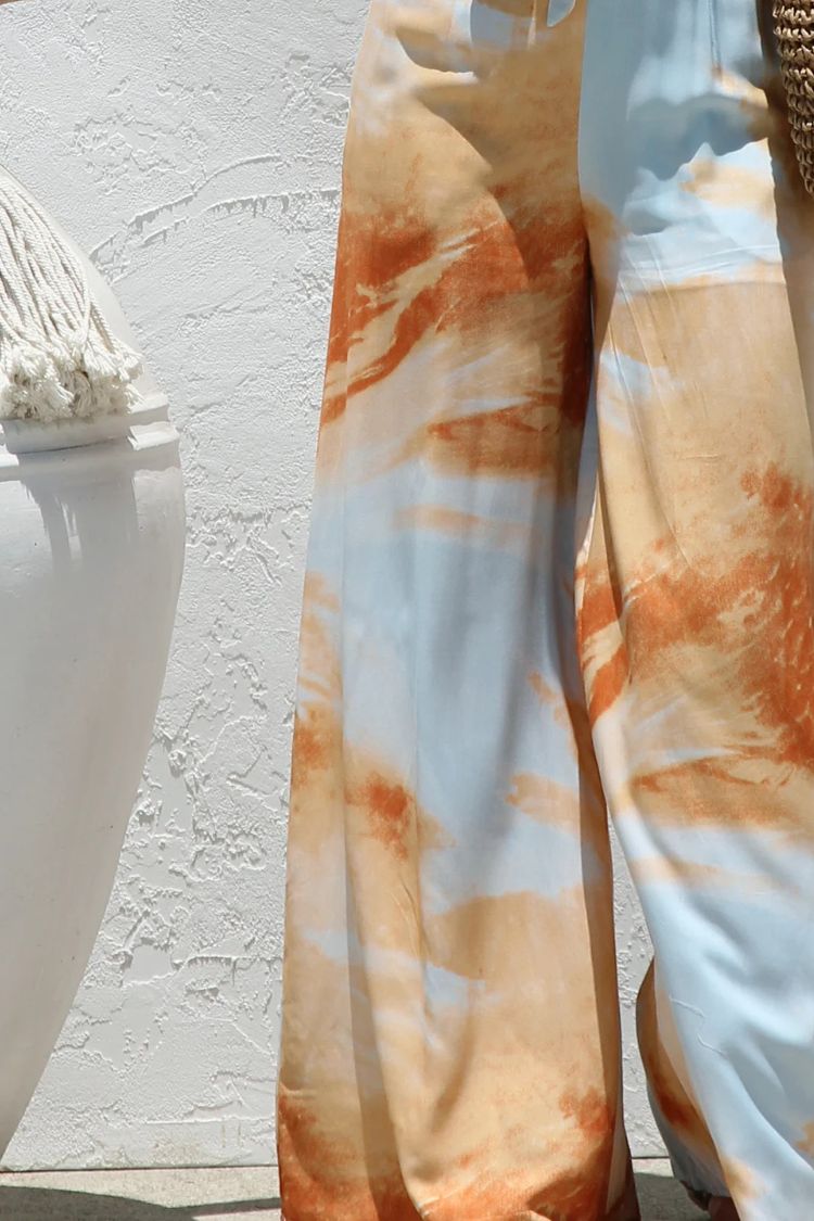 Unique Printed Suspender Back Pleated Pocket Wide-leg Jumpsuit - Fashionpara