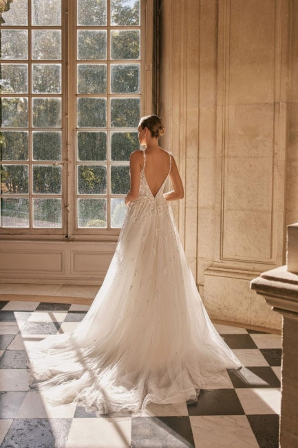 Elegant Spaghetti Straps Sleeveless A-Line Lace Wedding Gown with Refined Accents - Fashionpara