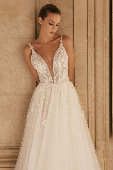 Elegant Spaghetti Straps Sleeveless A-Line Lace Wedding Gown with Refined Accents - Fashionpara