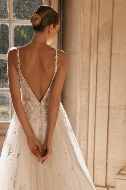 Elegant Spaghetti Straps Sleeveless A-Line Lace Wedding Gown with Refined Accents - Fashionpara
