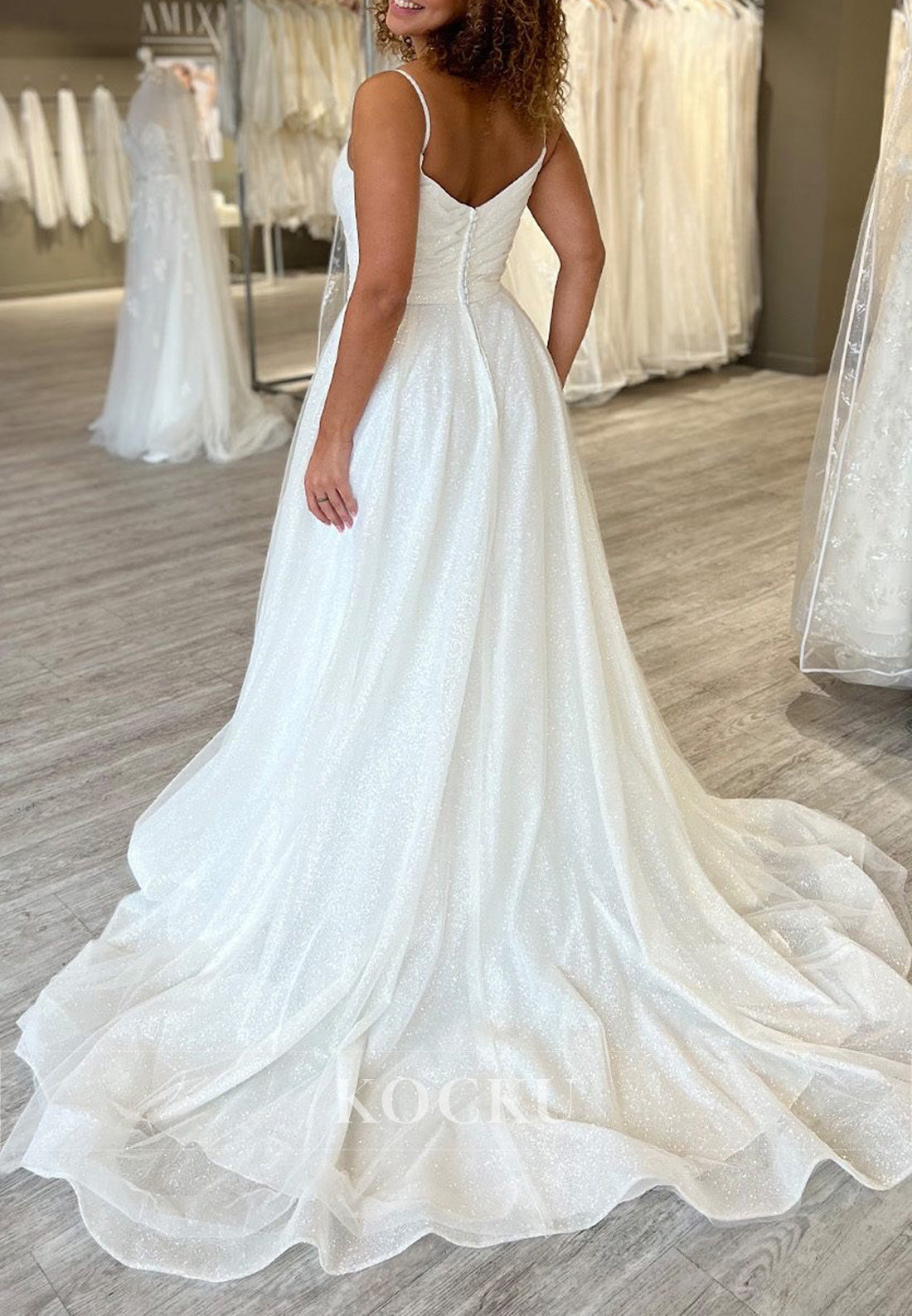 Spaghetti Strap V-Neck Glitter Tulle Ball Gown Wedding Dress with Pockets