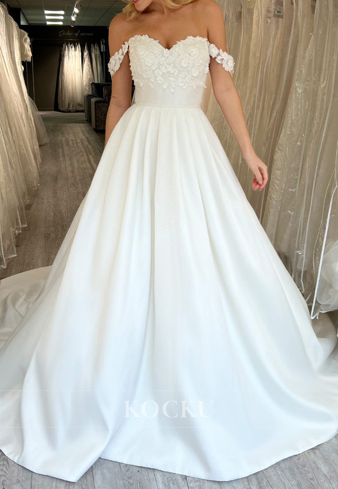 Off - Shoulder Satin Ball Gown Wedding Dress with Floral Appliqués